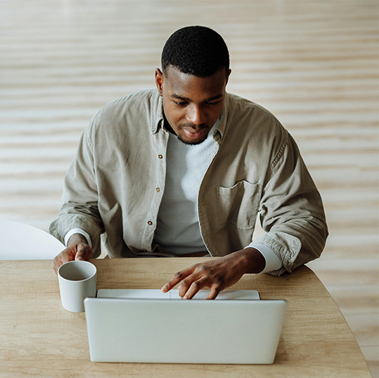 A businessman is checking digital signature solutions online | Privy AU